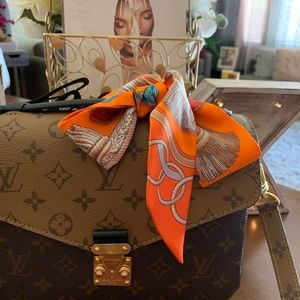 Authentic Hermès Orange Twilly